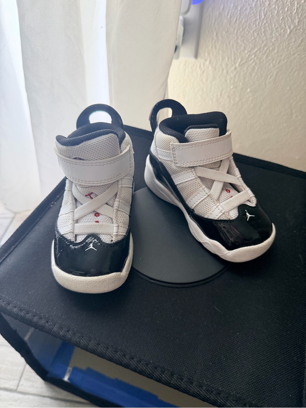 Jordan Kids Black and White High-Top Sneakers